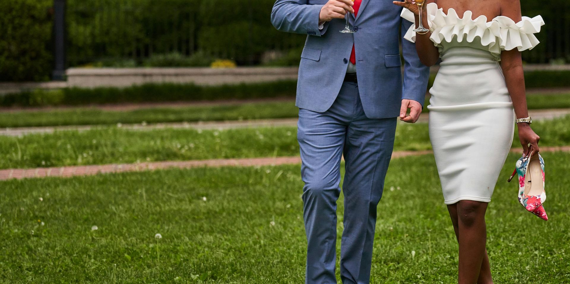 Wedding Couple Enjoying Drinks in a Park